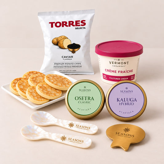 Date Night Caviar Set — Osetra Classic and Kaluga Hybrid caviar with blini, Torres chips, crème fraîche, two mother-of-pearl spoons and caviar key