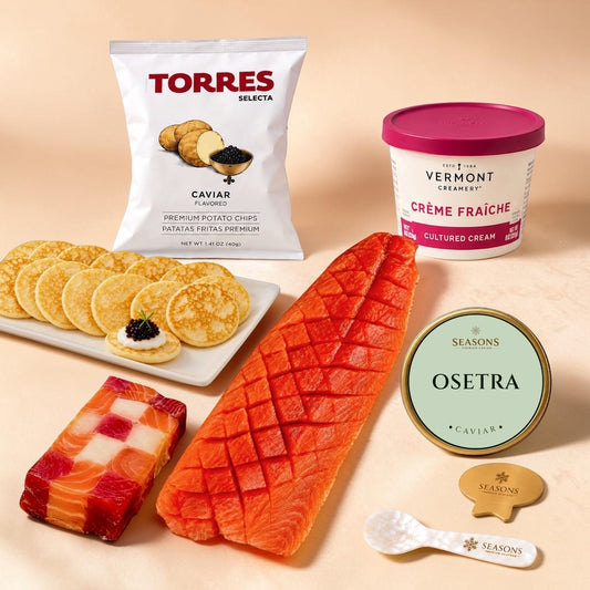 SEASONS Signature Feast set: chess roll, whole salmon yukola, Osetra caviar, blini, chips, crème fraîche, caviar key and spoon